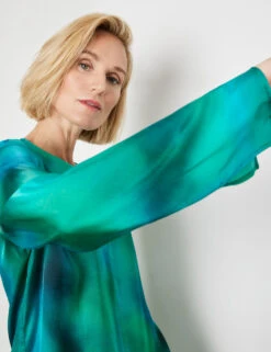 Gerry Weber Gemustertes Blusenshirt Mit Geschlitzten Ärmeln -Gerry Weber Verkäufe gemustertes blusenshirt mit geschlitzten aermeln 100