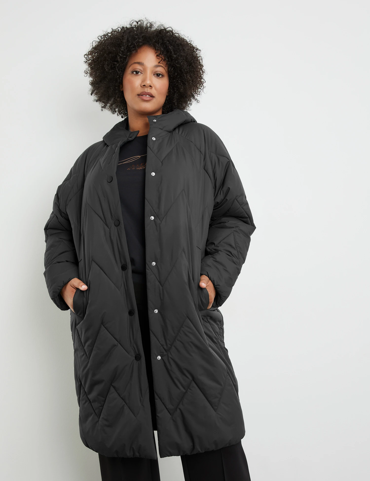 Leichter Steppmantel Mit Kapuze 3 Leichter Steppmantel Mit Kapuze