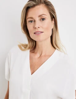 Gerry Weber Schlichtes Blusenshirt Mit Falte 12 Gerry Weber Schlichtes Blusenshirt Mit Falte -Gerry Weber Verkäufe schlichtes blusenshirt mit falte 100